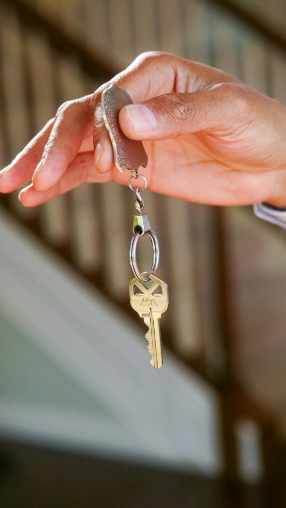 Photo by Kindel Media: https://www.pexels.com/photo/person-holding-a-keychain-with-key-7578984/