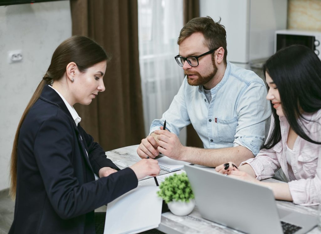 Photo by Mikhail Nilov: https://www.pexels.com/photo/people-having-conversation-7731323/